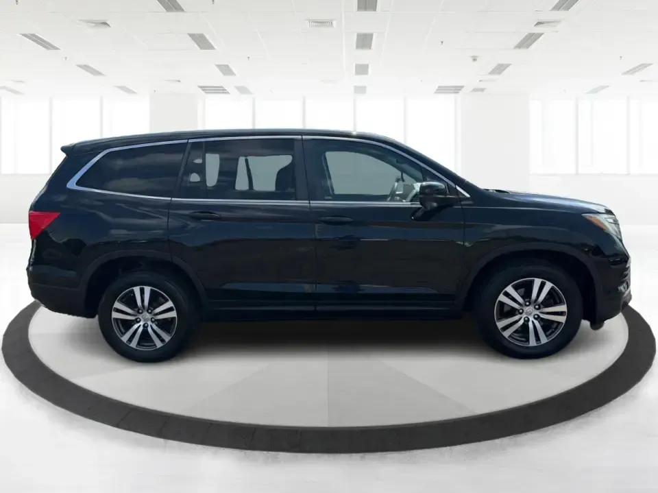 2016 Honda Pilot EXL 4WD (5FNYF6H63GB) with an 3.5L V6 SOHC 24V engine, 6-Speed Automatic transmission, located at 8750 N County Rd 25A, Piqua, OH, 45356, (937) 908-9800, 40.164391, -84.232513 - Need one SUV that can handle the school run, the long commute up I75, and a loaded-up weekend at Indian Lake? This 2016 Honda Pilot EXL 4WD is built for real life in West Central Ohio-room for up to 8 passengers, confident all-weather traction, and the comfort features that make everyday driving fee- Photo#1
