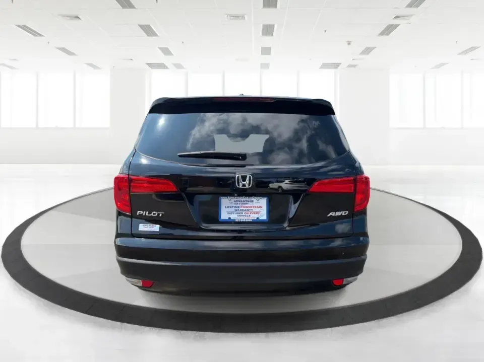 2016 Honda Pilot EXL 4WD (5FNYF6H63GB) with an 3.5L V6 SOHC 24V engine, 6-Speed Automatic transmission, located at 8750 N County Rd 25A, Piqua, OH, 45356, (937) 908-9800, 40.164391, -84.232513 - Need one SUV that can handle the school run, the long commute up I75, and a loaded-up weekend at Indian Lake? This 2016 Honda Pilot EXL 4WD is built for real life in West Central Ohio-room for up to 8 passengers, confident all-weather traction, and the comfort features that make everyday driving fee- Photo#3
