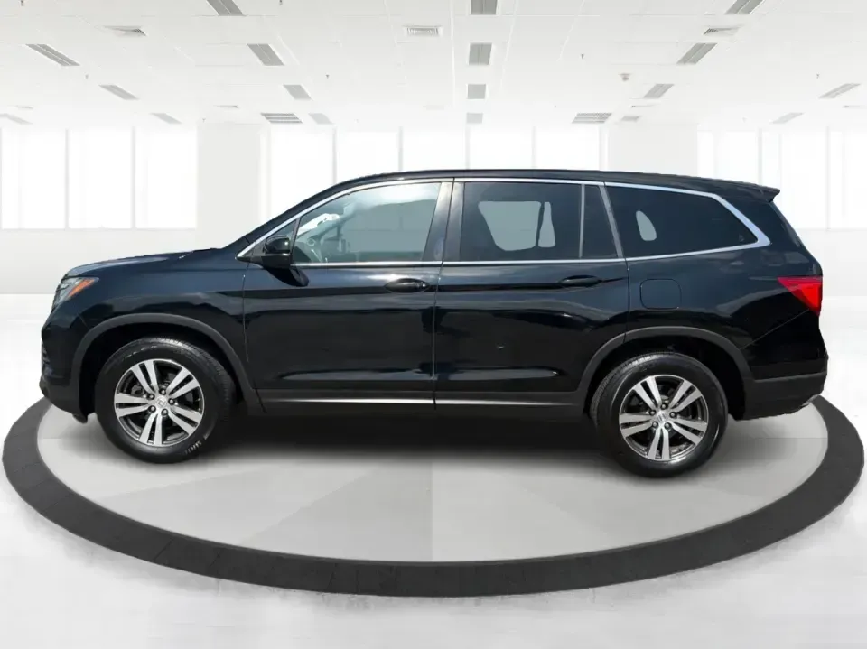 2016 Honda Pilot EXL 4WD (5FNYF6H63GB) with an 3.5L V6 SOHC 24V engine, 6-Speed Automatic transmission, located at 8750 N County Rd 25A, Piqua, OH, 45356, (937) 908-9800, 40.164391, -84.232513 - Need one SUV that can handle the school run, the long commute up I75, and a loaded-up weekend at Indian Lake? This 2016 Honda Pilot EXL 4WD is built for real life in West Central Ohio-room for up to 8 passengers, confident all-weather traction, and the comfort features that make everyday driving fee- Photo#5