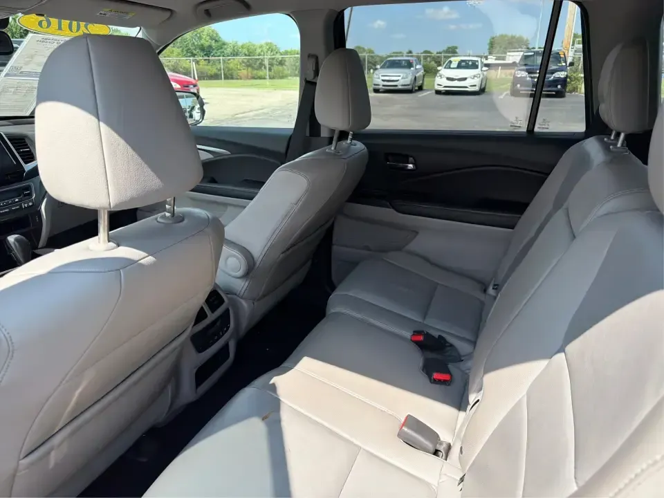 2016 Honda Pilot EXL 4WD (5FNYF6H63GB) with an 3.5L V6 SOHC 24V engine, 6-Speed Automatic transmission, located at 8750 N County Rd 25A, Piqua, OH, 45356, (937) 908-9800, 40.164391, -84.232513 - Need one SUV that can handle the school run, the long commute up I75, and a loaded-up weekend at Indian Lake? This 2016 Honda Pilot EXL 4WD is built for real life in West Central Ohio-room for up to 8 passengers, confident all-weather traction, and the comfort features that make everyday driving fee- Photo#10