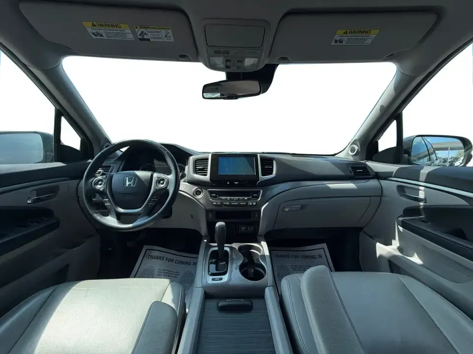 2016 Honda Pilot EXL 4WD (5FNYF6H63GB) with an 3.5L V6 SOHC 24V engine, 6-Speed Automatic transmission, located at 8750 N County Rd 25A, Piqua, OH, 45356, (937) 908-9800, 40.164391, -84.232513 - Need one SUV that can handle the school run, the long commute up I75, and a loaded-up weekend at Indian Lake? This 2016 Honda Pilot EXL 4WD is built for real life in West Central Ohio-room for up to 8 passengers, confident all-weather traction, and the comfort features that make everyday driving fee- Photo#19
