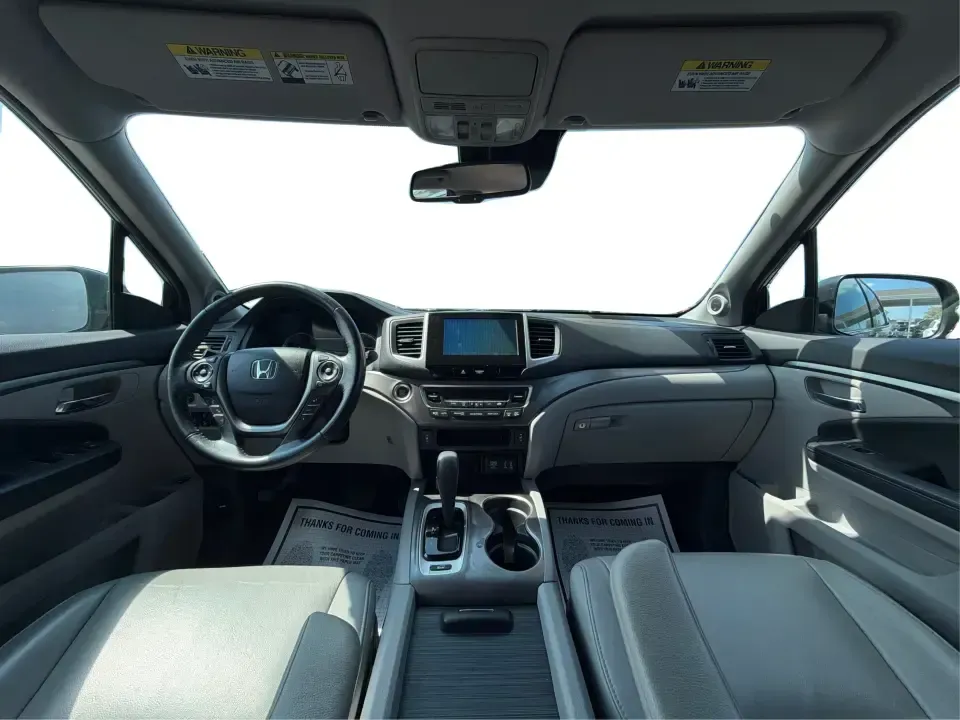 2016 Honda Pilot EXL 4WD (5FNYF6H63GB) with an 3.5L V6 SOHC 24V engine, 6-Speed Automatic transmission, located at 8750 N County Rd 25A, Piqua, OH, 45356, (937) 908-9800, 40.164391, -84.232513 - Need one SUV that can handle the school run, the long commute up I75, and a loaded-up weekend at Indian Lake? This 2016 Honda Pilot EXL 4WD is built for real life in West Central Ohio-room for up to 8 passengers, confident all-weather traction, and the comfort features that make everyday driving fee- Photo#20