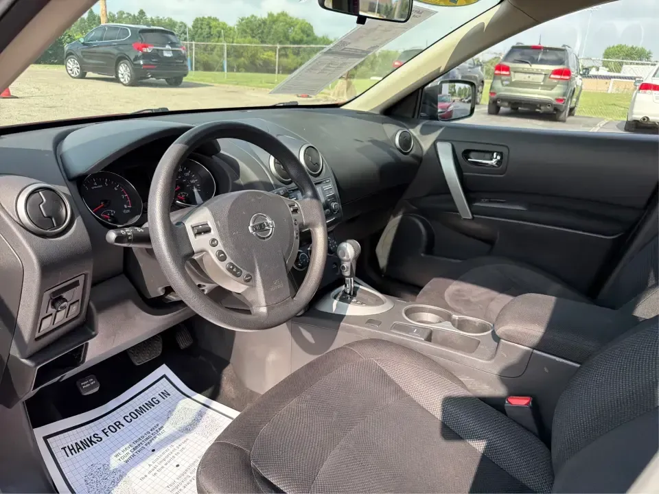 2015 Nissan Rogue S 2WD (JN8AS5MTXFW) with an 2.5L L4 DOHC 16V engine, Continuously Variable Transmission transmission, located at 1951 S Dayton Lakeview Rd., New Carlisle, OH, 45344, (937) 908-9800, 39.890999, -84.050255 - Need a practical SUV that fits real life in Clark County-school drop-offs, grocery runs, and weekend escapes to John Bryan State Park or Buck Creek-without feeling oversized? This **2015 Nissan Rogue S 2WD** in **Cayenne Red** is a smart, budget-friendly choice for commuters and growing families who- Photo#9