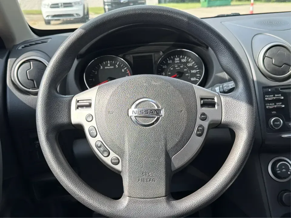2015 Nissan Rogue S 2WD (JN8AS5MTXFW) with an 2.5L L4 DOHC 16V engine, Continuously Variable Transmission transmission, located at 1951 S Dayton Lakeview Rd., New Carlisle, OH, 45344, (937) 908-9800, 39.890999, -84.050255 - Need a practical SUV that fits real life in Clark County-school drop-offs, grocery runs, and weekend escapes to John Bryan State Park or Buck Creek-without feeling oversized? This **2015 Nissan Rogue S 2WD** in **Cayenne Red** is a smart, budget-friendly choice for commuters and growing families who- Photo#16