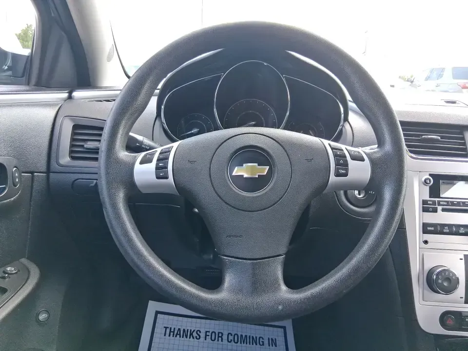 2012 Chevrolet Malibu 1LT (1G1ZC5E06CF) with an 2.4L L4 DOHC 16V engine, 6-Speed Automatic transmission, located at 880 E. National Road, Vandalia, OH, 45377, (937) 908-9800, 39.891918, -84.183594 - Need a dependable daily driver for work, school drop-offs, and those quick weekend getaways to Dayton? This 2012 Chevrolet Malibu 1LT is the kind of comfortable, efficient sedan that fits real life-easy to park downtown, smooth on longer highway runs, and roomy enough for five passengers plus grocer- Photo#16