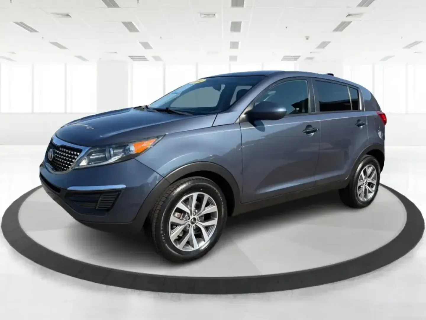 2014 Kia Sportage LX FWD (KNDPB3AC1E7) with an 2.4L V6 DOHC 24V engine, 6-Speed Automatic transmission, located at 1184 Kauffman Ave, Fairborn, OH, 45324, (937) 908-9800, 39.807072, -84.030914 - Weekend plans, school drop-offs, and everyday commuting around Wright-Patterson AFB all get easier when you've got a compact SUV that fits real life. This 2014 Kia Sportage LX FWD in Twilight Blue is a smart pick for Fairborn drivers who want SUV versatility without the bulk-great for grocery runs,- Photo#8