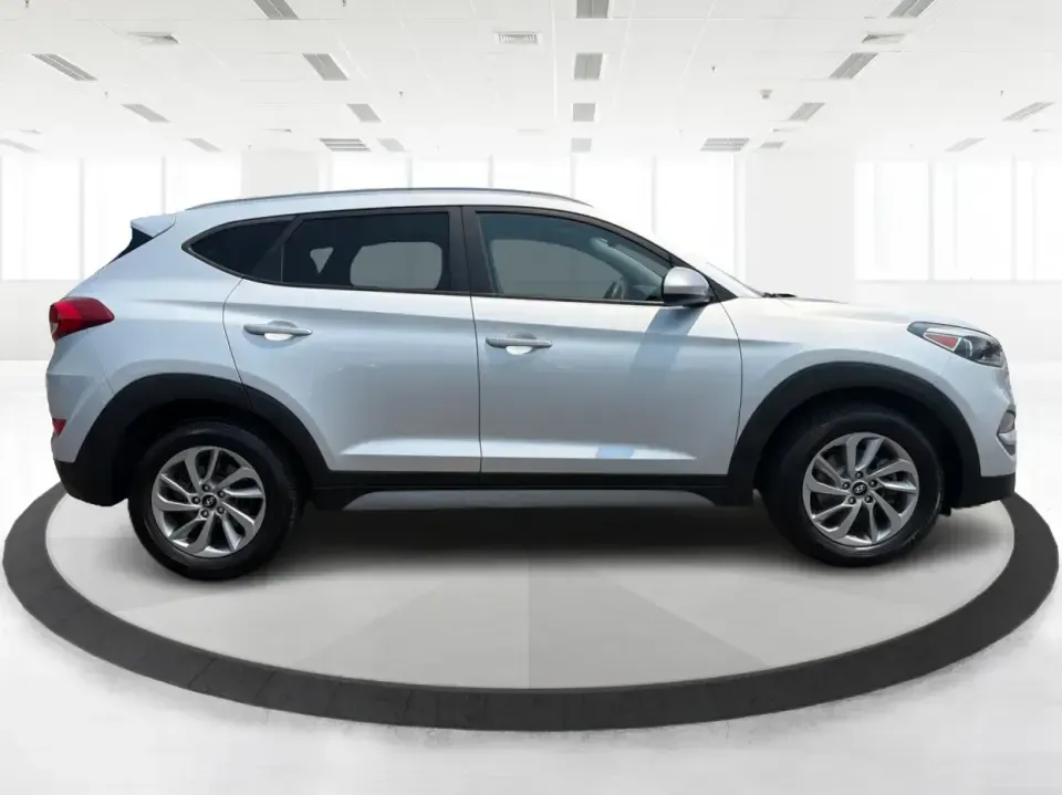 2017 Hyundai Tucson SE w/Preferred Package AWD (KM8J3CA41HU) with an 2.0L L4 DOHC 16V engine, 6-Speed Automatic transmission, located at 4508 South Dixie Dr, Moraine, OH, 45439, (937) 908-9800, 39.689976, -84.218452 - Pack up the kids for a day at Carillon Historical Park, load camping gear for a weekend at Caesar Creek, or tackle a snowy I75 commute with confidence-this **2017 Hyundai Tucson SE w/Preferred Package AWD** is the kind of SUV that fits real life in the Miami Valley. With its versatile cargo space, a- Photo#1