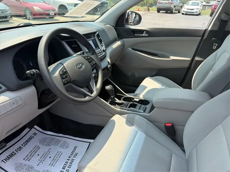2017 Hyundai Tucson SE w/Preferred Package AWD (KM8J3CA41HU) with an 2.0L L4 DOHC 16V engine, 6-Speed Automatic transmission, located at 4508 South Dixie Dr, Moraine, OH, 45439, (937) 908-9800, 39.689976, -84.218452 - Pack up the kids for a day at Carillon Historical Park, load camping gear for a weekend at Caesar Creek, or tackle a snowy I75 commute with confidence-this **2017 Hyundai Tucson SE w/Preferred Package AWD** is the kind of SUV that fits real life in the Miami Valley. With its versatile cargo space, a- Photo#9