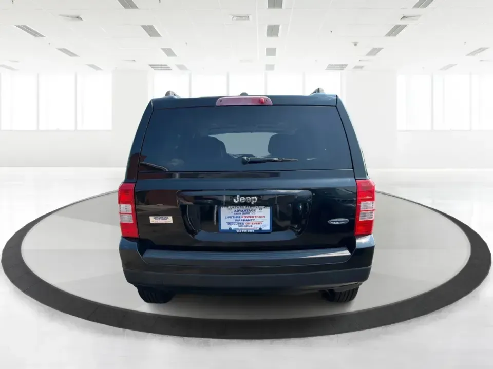 2014 Jeep Patriot Latitude 2WD (1C4NJPFA2ED) with an 2.0L L4 DOHC 16V engine, located at 8750 N County Rd 25A, Piqua, OH, 45356, (937) 908-9800, 40.164391, -84.232513 - Need a practical SUV for school runs, daily commutes to Troy or Dayton, and spontaneous weekend getaways without stretching the budget? This **2014 Jeep Patriot Latitude 2WD** is a smart, flexible choice for drivers who want SUV space, easy-to-live-with comfort, and a straightforward ownership exper- Photo#3