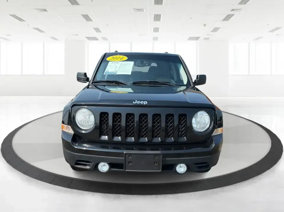 2014 Jeep Patriot Latitude 2WD (1C4NJPFA2ED) with an 2.0L L4 DOHC 16V engine, located at 8750 N County Rd 25A, Piqua, OH, 45356, (937) 908-9800, 40.164391, -84.232513 - Need a practical SUV for school runs, daily commutes to Troy or Dayton, and spontaneous weekend getaways without stretching the budget? This **2014 Jeep Patriot Latitude 2WD** is a smart, flexible choice for drivers who want SUV space, easy-to-live-with comfort, and a straightforward ownership exper- Photo#7