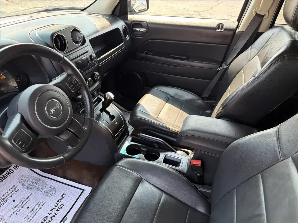 2014 Jeep Patriot Latitude 2WD (1C4NJPFA2ED) with an 2.0L L4 DOHC 16V engine, located at 8750 N County Rd 25A, Piqua, OH, 45356, (937) 908-9800, 40.164391, -84.232513 - Need a practical SUV for school runs, daily commutes to Troy or Dayton, and spontaneous weekend getaways without stretching the budget? This **2014 Jeep Patriot Latitude 2WD** is a smart, flexible choice for drivers who want SUV space, easy-to-live-with comfort, and a straightforward ownership exper- Photo#9