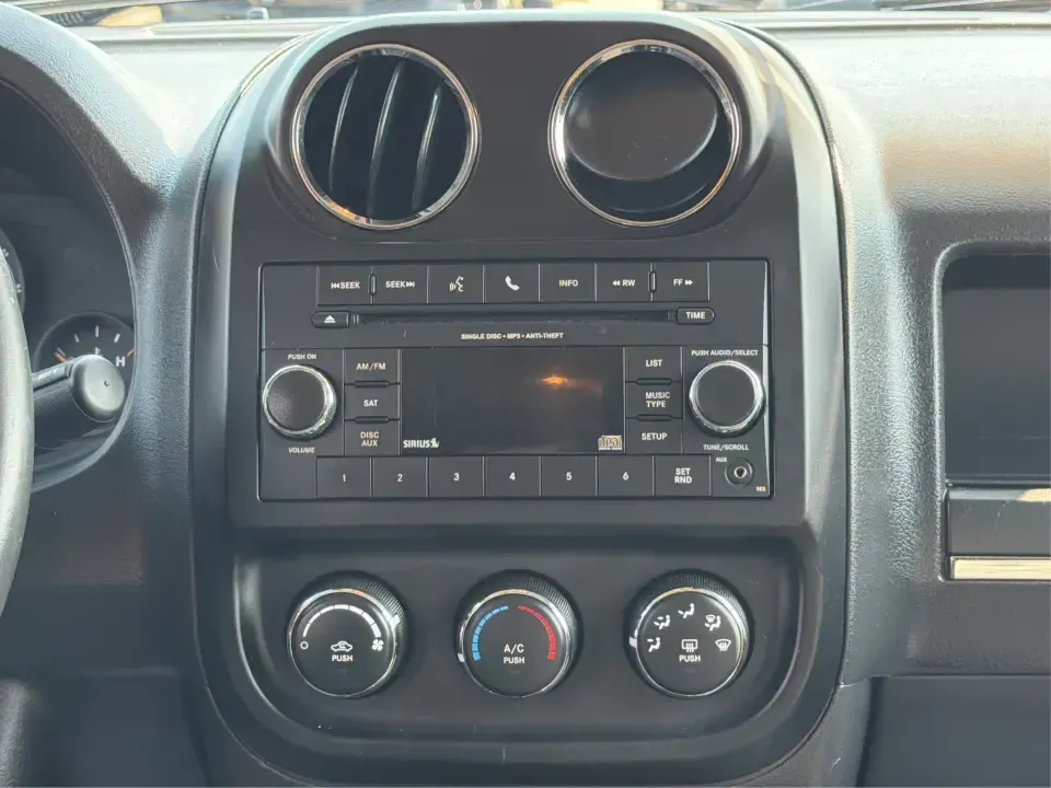 2014 Jeep Patriot Latitude 2WD (1C4NJPFA2ED) with an 2.0L L4 DOHC 16V engine, located at 8750 N County Rd 25A, Piqua, OH, 45356, (937) 908-9800, 40.164391, -84.232513 - Need a practical SUV for school runs, daily commutes to Troy or Dayton, and spontaneous weekend getaways without stretching the budget? This **2014 Jeep Patriot Latitude 2WD** is a smart, flexible choice for drivers who want SUV space, easy-to-live-with comfort, and a straightforward ownership exper- Photo#13