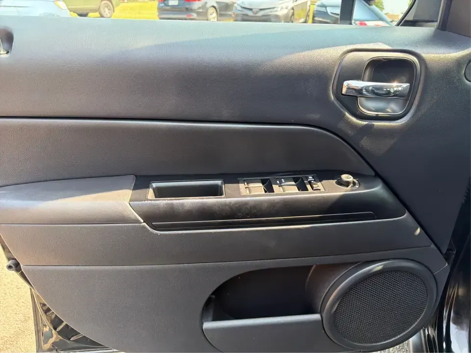 2014 Jeep Patriot Latitude 2WD (1C4NJPFA2ED) with an 2.0L L4 DOHC 16V engine, located at 8750 N County Rd 25A, Piqua, OH, 45356, (937) 908-9800, 40.164391, -84.232513 - Need a practical SUV for school runs, daily commutes to Troy or Dayton, and spontaneous weekend getaways without stretching the budget? This **2014 Jeep Patriot Latitude 2WD** is a smart, flexible choice for drivers who want SUV space, easy-to-live-with comfort, and a straightforward ownership exper- Photo#18