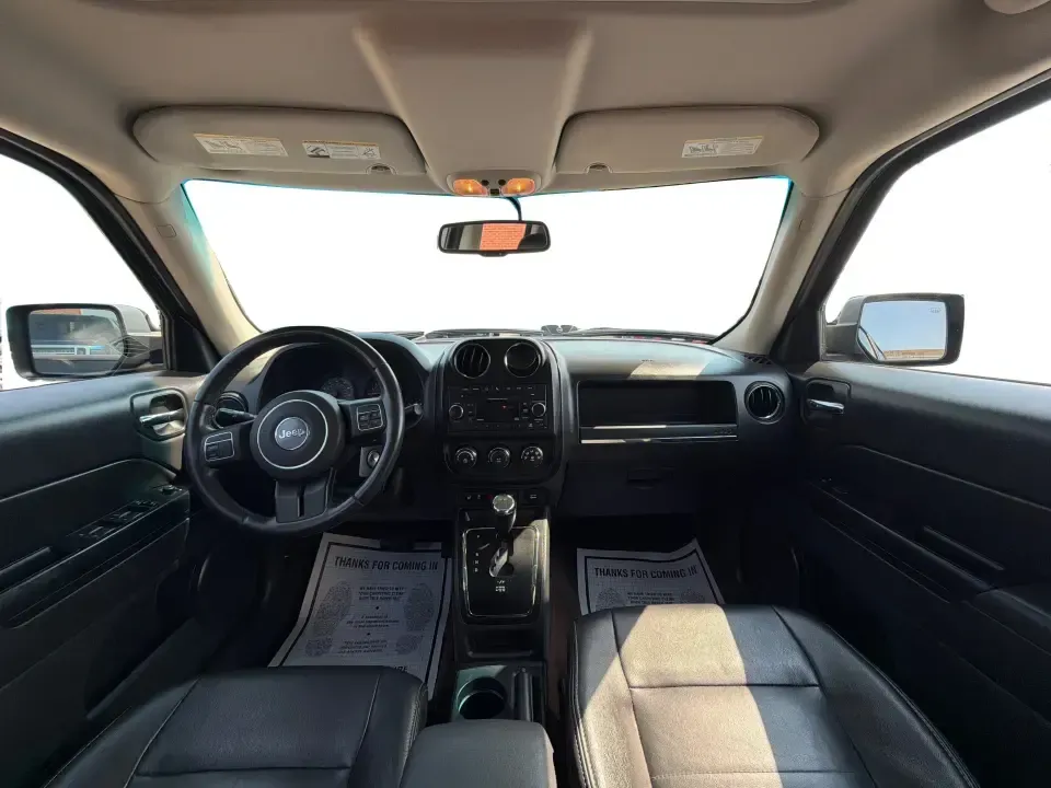 2014 Jeep Patriot Latitude 2WD (1C4NJPFA2ED) with an 2.0L L4 DOHC 16V engine, located at 8750 N County Rd 25A, Piqua, OH, 45356, (937) 908-9800, 40.164391, -84.232513 - Need a practical SUV for school runs, daily commutes to Troy or Dayton, and spontaneous weekend getaways without stretching the budget? This **2014 Jeep Patriot Latitude 2WD** is a smart, flexible choice for drivers who want SUV space, easy-to-live-with comfort, and a straightforward ownership exper- Photo#20
