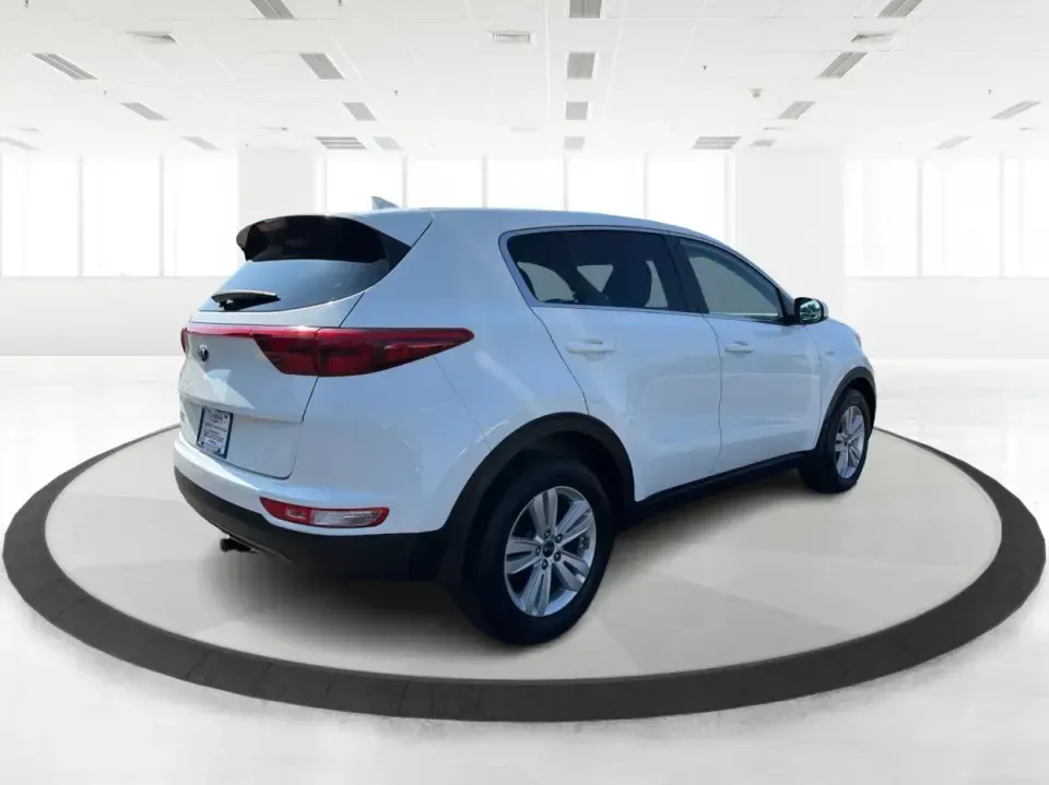 2017 Kia Sportage LX AWD (KNDPMCAC5H7) with an 2.4L V6 DOHC 24V engine, 6-Speed Automatic transmission, located at 1184 Kauffman Ave, Fairborn, OH, 45324, (937) 908-9800, 39.807072, -84.030914 - Weekend getaways to John Bryan State Park, snowy school runs, or the daily commute down I675-this 2017 Kia Sportage LX AWD is built for real life in the Miami Valley. With confident all-wheel drive and SUV versatility, it's a smart pick for drivers who want a practical crossover that can handle Ohio- Photo#2