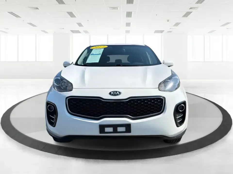 2017 Kia Sportage LX AWD (KNDPMCAC5H7) with an 2.4L V6 DOHC 24V engine, 6-Speed Automatic transmission, located at 1184 Kauffman Ave, Fairborn, OH, 45324, (937) 908-9800, 39.807072, -84.030914 - Weekend getaways to John Bryan State Park, snowy school runs, or the daily commute down I675-this 2017 Kia Sportage LX AWD is built for real life in the Miami Valley. With confident all-wheel drive and SUV versatility, it's a smart pick for drivers who want a practical crossover that can handle Ohio- Photo#7
