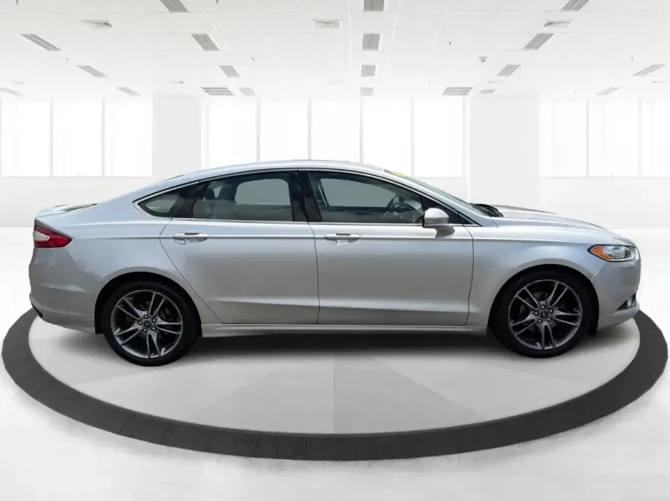 2014 Ford Fusion Titanium AWD (3FA6P0D98ER) with an 2.0L L4 DOHC 16V engine, located at 1099 N County Rd 25A , Troy, OH, 45373, (937) 908-9800, 40.057079, -84.212883 - Need a smart, comfortable sedan that can handle Ohio's changing weather for daily commuting, school drop-offs, and weekend getaways? This 2014 Ford Fusion Titanium AWD is built for real life in and around Troy-whether you're cruising down I75 to Dayton, heading across town on N County Rd 25A, or pla- Photo#1