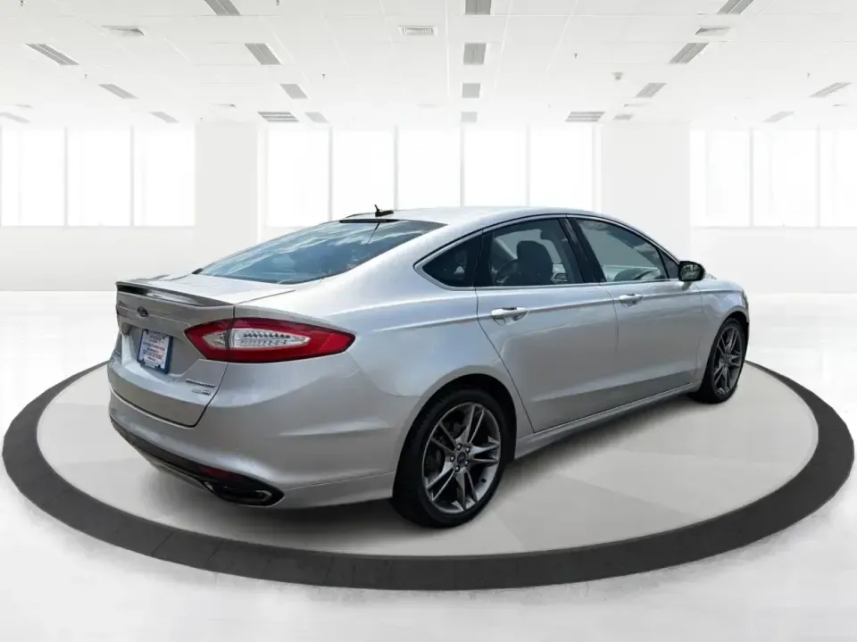 2014 Ford Fusion Titanium AWD (3FA6P0D98ER) with an 2.0L L4 DOHC 16V engine, located at 1099 N County Rd 25A , Troy, OH, 45373, (937) 908-9800, 40.057079, -84.212883 - Need a smart, comfortable sedan that can handle Ohio's changing weather for daily commuting, school drop-offs, and weekend getaways? This 2014 Ford Fusion Titanium AWD is built for real life in and around Troy-whether you're cruising down I75 to Dayton, heading across town on N County Rd 25A, or pla- Photo#2