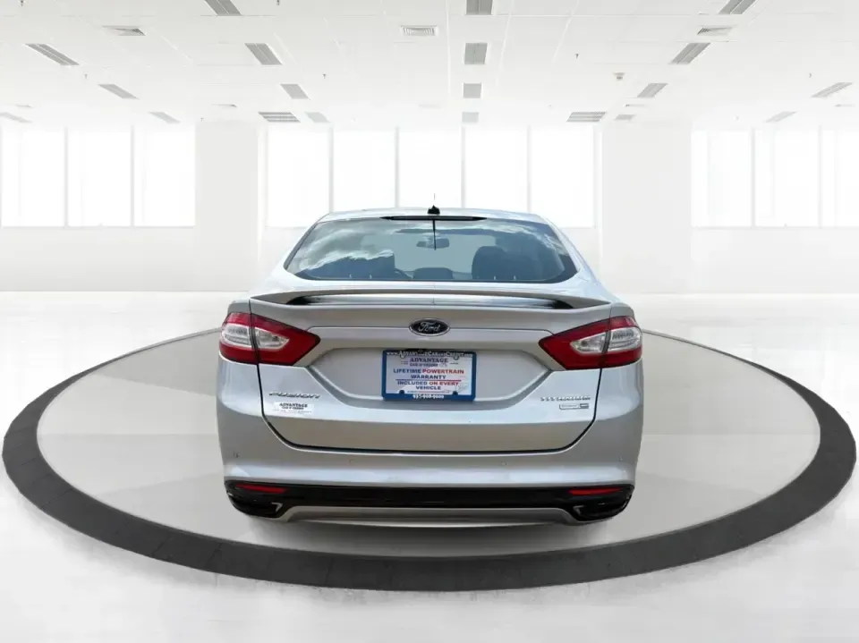 2014 Ford Fusion Titanium AWD (3FA6P0D98ER) with an 2.0L L4 DOHC 16V engine, located at 1099 N County Rd 25A , Troy, OH, 45373, (937) 908-9800, 40.057079, -84.212883 - Need a smart, comfortable sedan that can handle Ohio's changing weather for daily commuting, school drop-offs, and weekend getaways? This 2014 Ford Fusion Titanium AWD is built for real life in and around Troy-whether you're cruising down I75 to Dayton, heading across town on N County Rd 25A, or pla- Photo#3