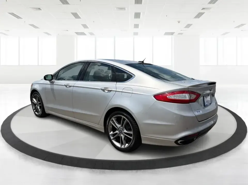 2014 Ford Fusion Titanium AWD (3FA6P0D98ER) with an 2.0L L4 DOHC 16V engine, located at 1099 N County Rd 25A , Troy, OH, 45373, (937) 908-9800, 40.057079, -84.212883 - Need a smart, comfortable sedan that can handle Ohio's changing weather for daily commuting, school drop-offs, and weekend getaways? This 2014 Ford Fusion Titanium AWD is built for real life in and around Troy-whether you're cruising down I75 to Dayton, heading across town on N County Rd 25A, or pla- Photo#4