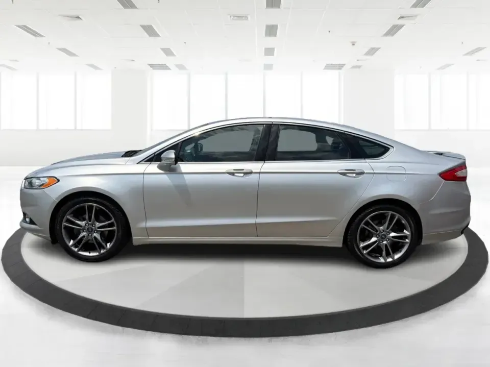 2014 Ford Fusion Titanium AWD (3FA6P0D98ER) with an 2.0L L4 DOHC 16V engine, located at 1099 N County Rd 25A , Troy, OH, 45373, (937) 908-9800, 40.057079, -84.212883 - Need a smart, comfortable sedan that can handle Ohio's changing weather for daily commuting, school drop-offs, and weekend getaways? This 2014 Ford Fusion Titanium AWD is built for real life in and around Troy-whether you're cruising down I75 to Dayton, heading across town on N County Rd 25A, or pla- Photo#5
