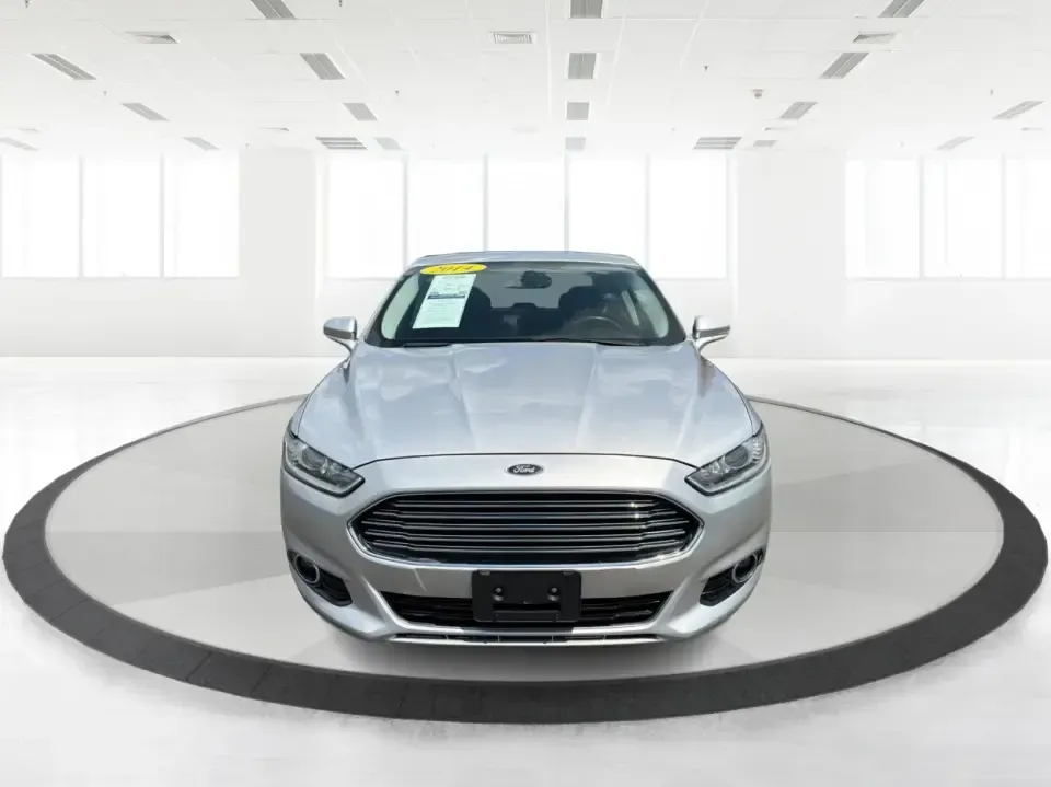 2014 Ford Fusion Titanium AWD (3FA6P0D98ER) with an 2.0L L4 DOHC 16V engine, located at 1099 N County Rd 25A , Troy, OH, 45373, (937) 908-9800, 40.057079, -84.212883 - Need a smart, comfortable sedan that can handle Ohio's changing weather for daily commuting, school drop-offs, and weekend getaways? This 2014 Ford Fusion Titanium AWD is built for real life in and around Troy-whether you're cruising down I75 to Dayton, heading across town on N County Rd 25A, or pla- Photo#7