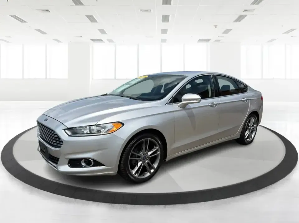 2014 Ford Fusion Titanium AWD (3FA6P0D98ER) with an 2.0L L4 DOHC 16V engine, located at 1099 N County Rd 25A , Troy, OH, 45373, (937) 908-9800, 40.057079, -84.212883 - Need a smart, comfortable sedan that can handle Ohio's changing weather for daily commuting, school drop-offs, and weekend getaways? This 2014 Ford Fusion Titanium AWD is built for real life in and around Troy-whether you're cruising down I75 to Dayton, heading across town on N County Rd 25A, or pla- Photo#8
