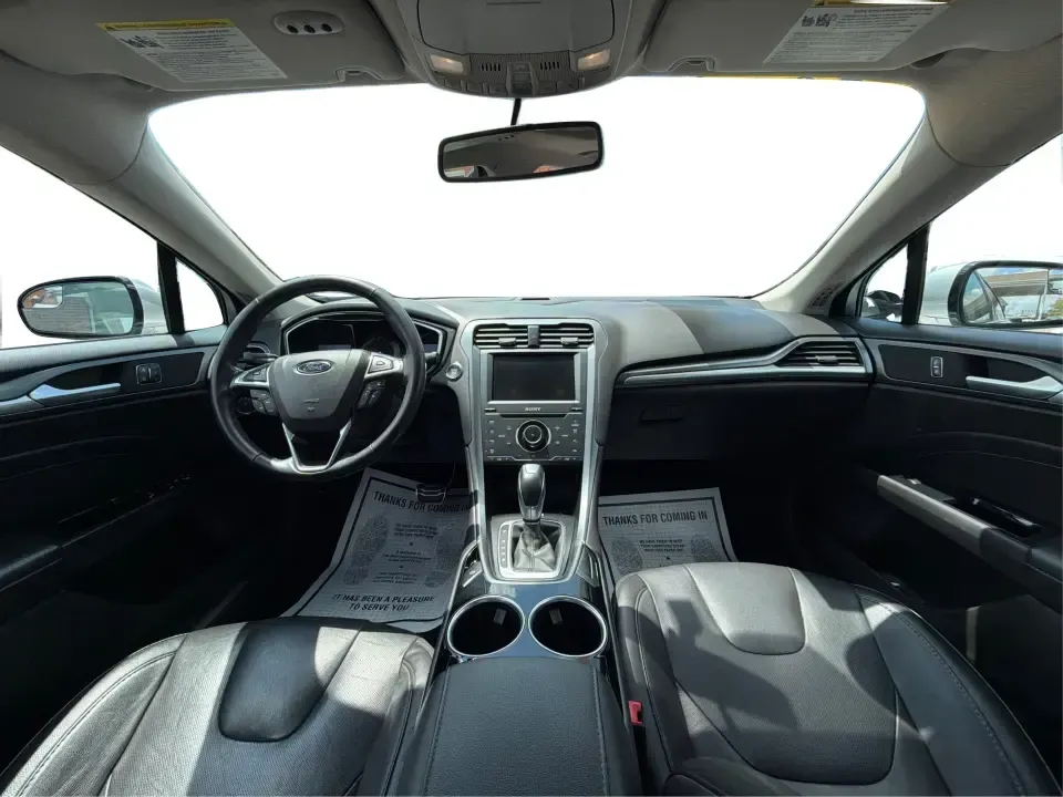 2014 Ford Fusion Titanium AWD (3FA6P0D98ER) with an 2.0L L4 DOHC 16V engine, located at 1099 N County Rd 25A , Troy, OH, 45373, (937) 908-9800, 40.057079, -84.212883 - Need a smart, comfortable sedan that can handle Ohio's changing weather for daily commuting, school drop-offs, and weekend getaways? This 2014 Ford Fusion Titanium AWD is built for real life in and around Troy-whether you're cruising down I75 to Dayton, heading across town on N County Rd 25A, or pla- Photo#22