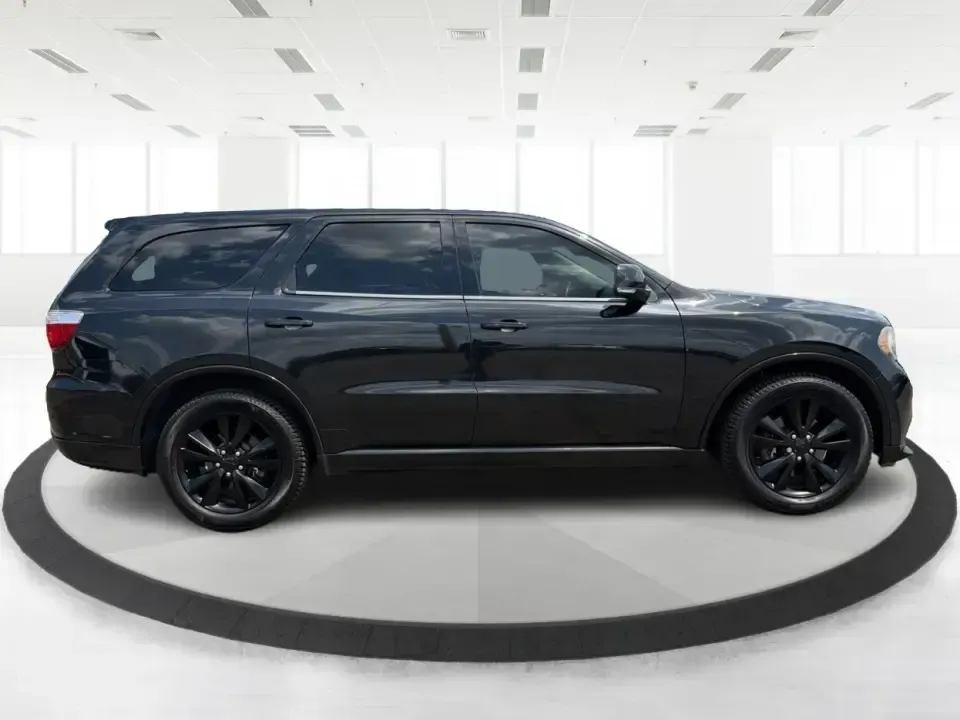 2013 Dodge Durango R/T AWD (1C4SDJCT3DC) with an 5.7L V8 OHV 16V engine, 5-Speed Automatic transmission, located at 1230 East Main St, Xenia, OH, 45385, (937) 908-9800, 39.688026, -83.910172 - Load up the crew, cue the playlist, and point the hood toward the next weekend getaway-this 2013 Dodge Durango R/T AWD is built for families and adventure-seekers who want V8 muscle, three-row space, and all-weather confidence for life in and around Xenia. Whether you're shuttling kids to practice,- Photo#1