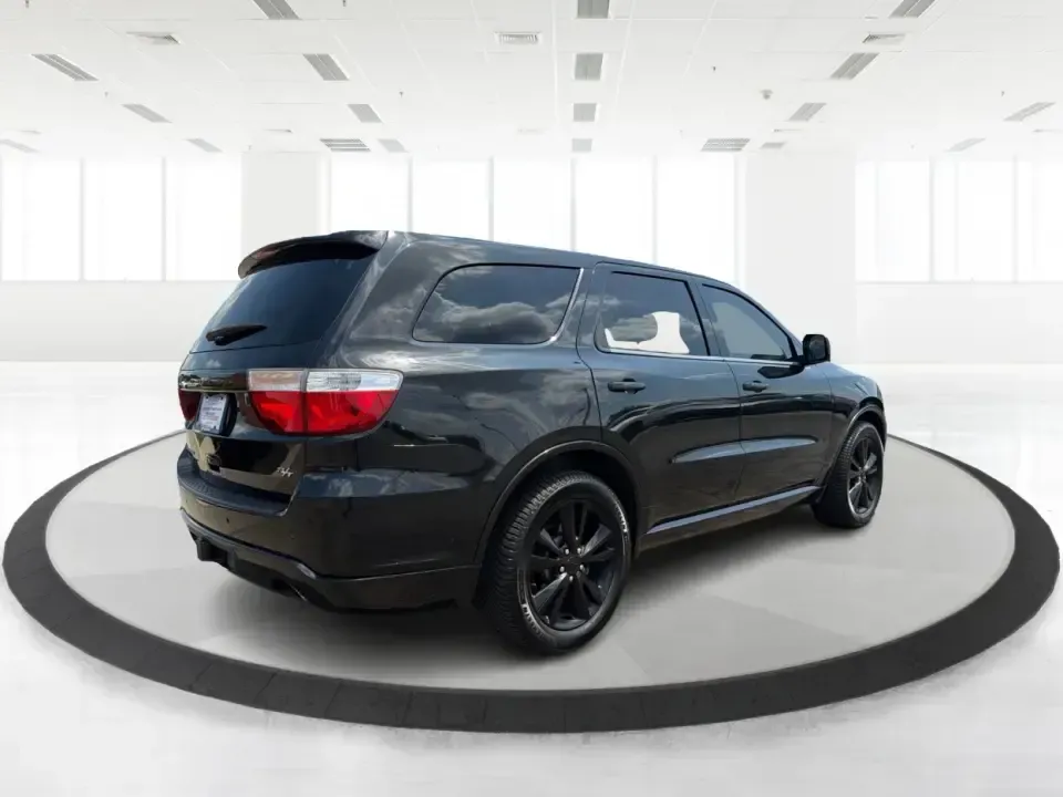 2013 Dodge Durango R/T AWD (1C4SDJCT3DC) with an 5.7L V8 OHV 16V engine, 5-Speed Automatic transmission, located at 1230 East Main St, Xenia, OH, 45385, (937) 908-9800, 39.688026, -83.910172 - Load up the crew, cue the playlist, and point the hood toward the next weekend getaway-this 2013 Dodge Durango R/T AWD is built for families and adventure-seekers who want V8 muscle, three-row space, and all-weather confidence for life in and around Xenia. Whether you're shuttling kids to practice,- Photo#2