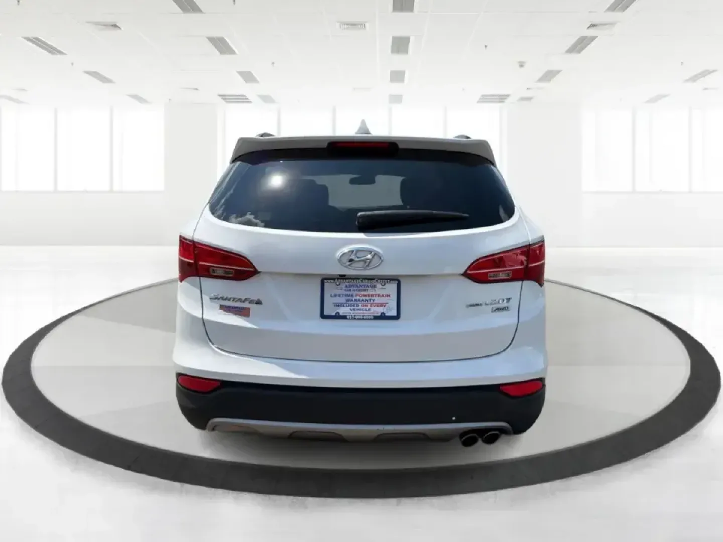 2014 Hyundai Santa Fe Sport 2.0T AWD (5XYZUDLA1EG) with an 2.0L L4 DOHC 16V TURBO engine, 6-Speed Automatic transmission, located at 1230 East Main St, Xenia, OH, 45385, (937) 908-9800, 39.688026, -83.910172 - When your week looks like school drop-offs, a long commute down US-35, and a weekend escape to John Bryan State Park or a soccer tournament near Shawnee Park, you need an SUV that can flex with real life. This 2014 Hyundai Santa Fe Sport 2.0T AWD is built for busy families, outdoorsy couples, and bu- Photo#3