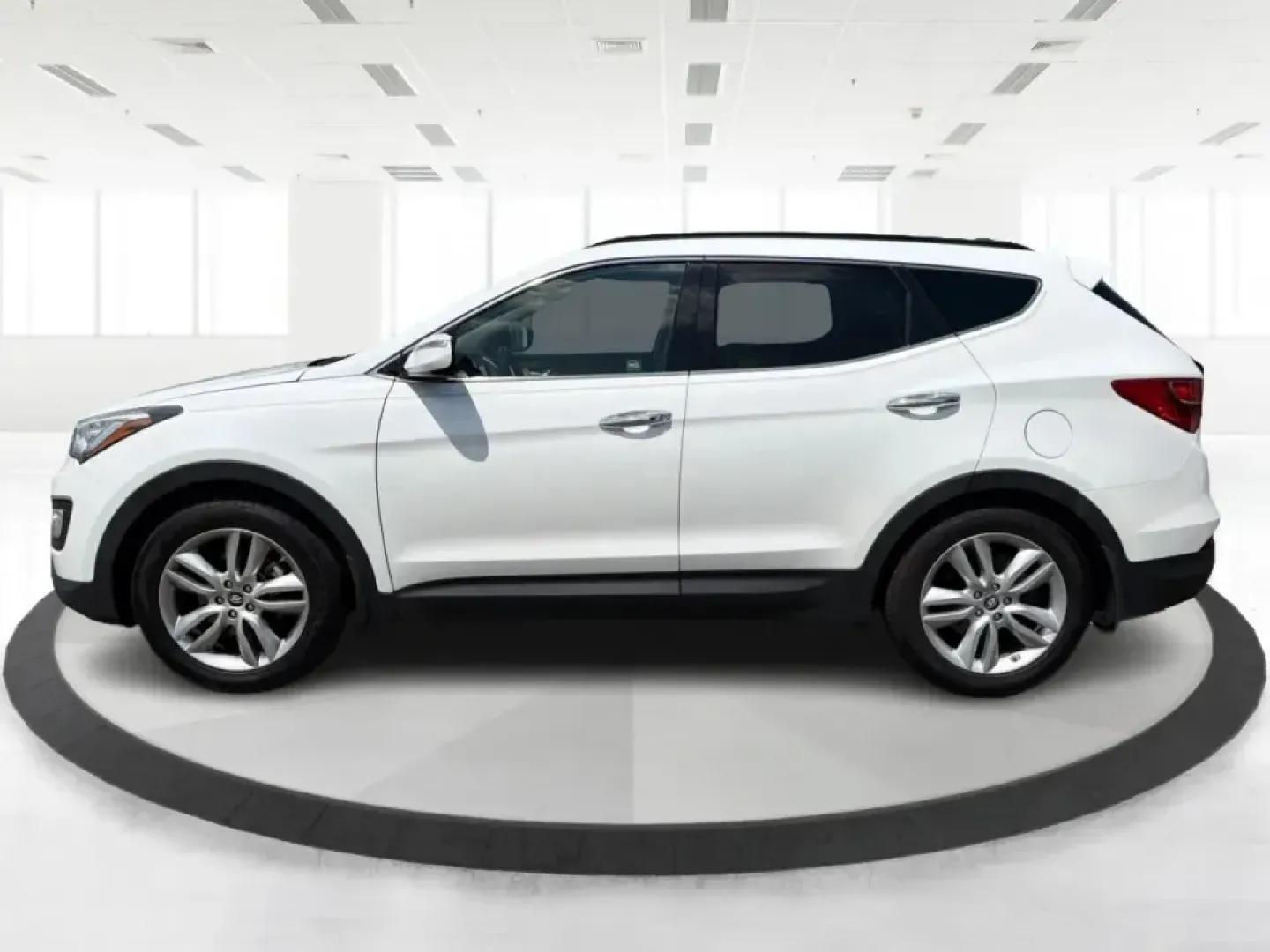 2014 Hyundai Santa Fe Sport 2.0T AWD (5XYZUDLA1EG) with an 2.0L L4 DOHC 16V TURBO engine, 6-Speed Automatic transmission, located at 1230 East Main St, Xenia, OH, 45385, (937) 908-9800, 39.688026, -83.910172 - When your week looks like school drop-offs, a long commute down US-35, and a weekend escape to John Bryan State Park or a soccer tournament near Shawnee Park, you need an SUV that can flex with real life. This 2014 Hyundai Santa Fe Sport 2.0T AWD is built for busy families, outdoorsy couples, and bu- Photo#5