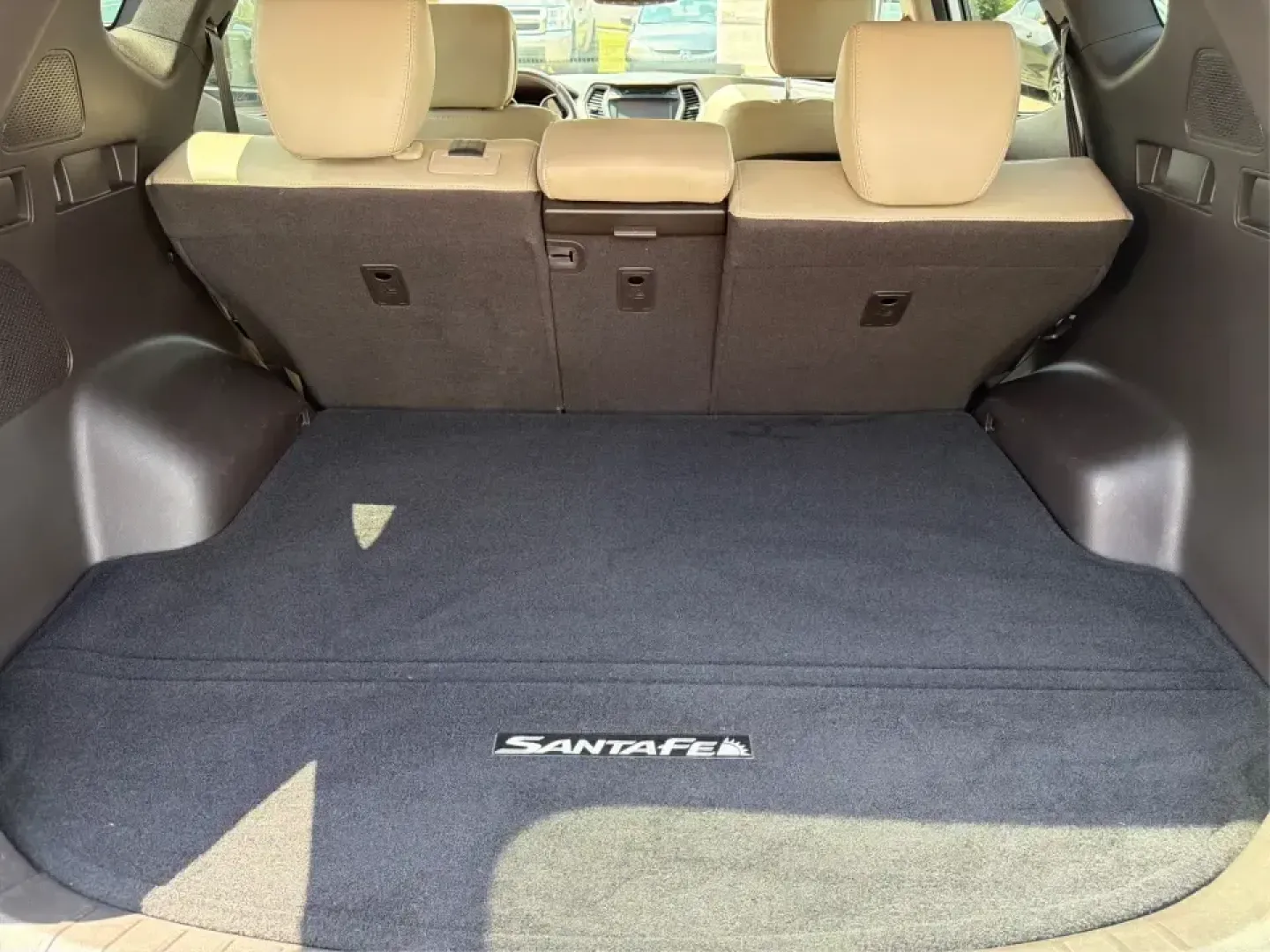2014 Hyundai Santa Fe Sport 2.0T AWD (5XYZUDLA1EG) with an 2.0L L4 DOHC 16V TURBO engine, 6-Speed Automatic transmission, located at 1230 East Main St, Xenia, OH, 45385, (937) 908-9800, 39.688026, -83.910172 - When your week looks like school drop-offs, a long commute down US-35, and a weekend escape to John Bryan State Park or a soccer tournament near Shawnee Park, you need an SUV that can flex with real life. This 2014 Hyundai Santa Fe Sport 2.0T AWD is built for busy families, outdoorsy couples, and bu- Photo#11