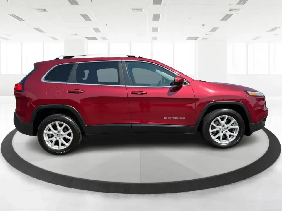 2017 Jeep Cherokee Latitude FWD (1C4PJLCB5HW) with an 2.4L L4 DOHC 16V engine, 9-Speed Automatic transmission, located at 401 Woodman Dr, Riverside, OH, 45431, (937) 908-9800, 39.760899, -84.123421 - Need a crossover that fits real life in the Miami Valley-school drop-offs, I675 commutes, grocery runs, and the occasional weekend escape to Carillon Historical Park or a hike near the Mad River? This 2017 Jeep Cherokee Latitude FWD in Deep Cherry Red Crystal Pearlcoat is built for everyday versatil- Photo#1