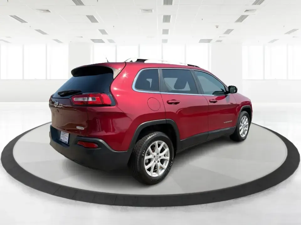 2017 Jeep Cherokee Latitude FWD (1C4PJLCB5HW) with an 2.4L L4 DOHC 16V engine, 9-Speed Automatic transmission, located at 401 Woodman Dr, Riverside, OH, 45431, (937) 908-9800, 39.760899, -84.123421 - Need a crossover that fits real life in the Miami Valley-school drop-offs, I675 commutes, grocery runs, and the occasional weekend escape to Carillon Historical Park or a hike near the Mad River? This 2017 Jeep Cherokee Latitude FWD in Deep Cherry Red Crystal Pearlcoat is built for everyday versatil- Photo#2