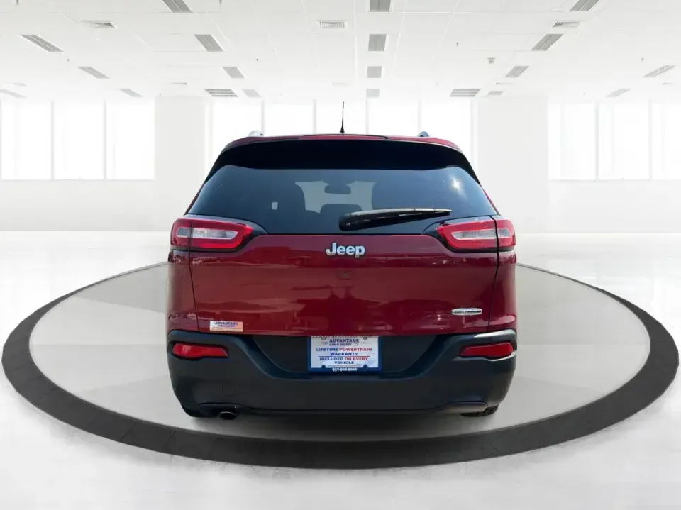 2017 Jeep Cherokee Latitude FWD (1C4PJLCB5HW) with an 2.4L L4 DOHC 16V engine, 9-Speed Automatic transmission, located at 401 Woodman Dr, Riverside, OH, 45431, (937) 908-9800, 39.760899, -84.123421 - Need a crossover that fits real life in the Miami Valley-school drop-offs, I675 commutes, grocery runs, and the occasional weekend escape to Carillon Historical Park or a hike near the Mad River? This 2017 Jeep Cherokee Latitude FWD in Deep Cherry Red Crystal Pearlcoat is built for everyday versatil- Photo#3