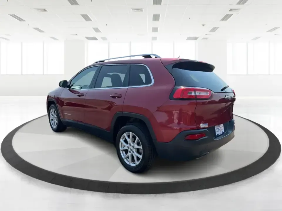 2017 Jeep Cherokee Latitude FWD (1C4PJLCB5HW) with an 2.4L L4 DOHC 16V engine, 9-Speed Automatic transmission, located at 401 Woodman Dr, Riverside, OH, 45431, (937) 908-9800, 39.760899, -84.123421 - Need a crossover that fits real life in the Miami Valley-school drop-offs, I675 commutes, grocery runs, and the occasional weekend escape to Carillon Historical Park or a hike near the Mad River? This 2017 Jeep Cherokee Latitude FWD in Deep Cherry Red Crystal Pearlcoat is built for everyday versatil- Photo#4