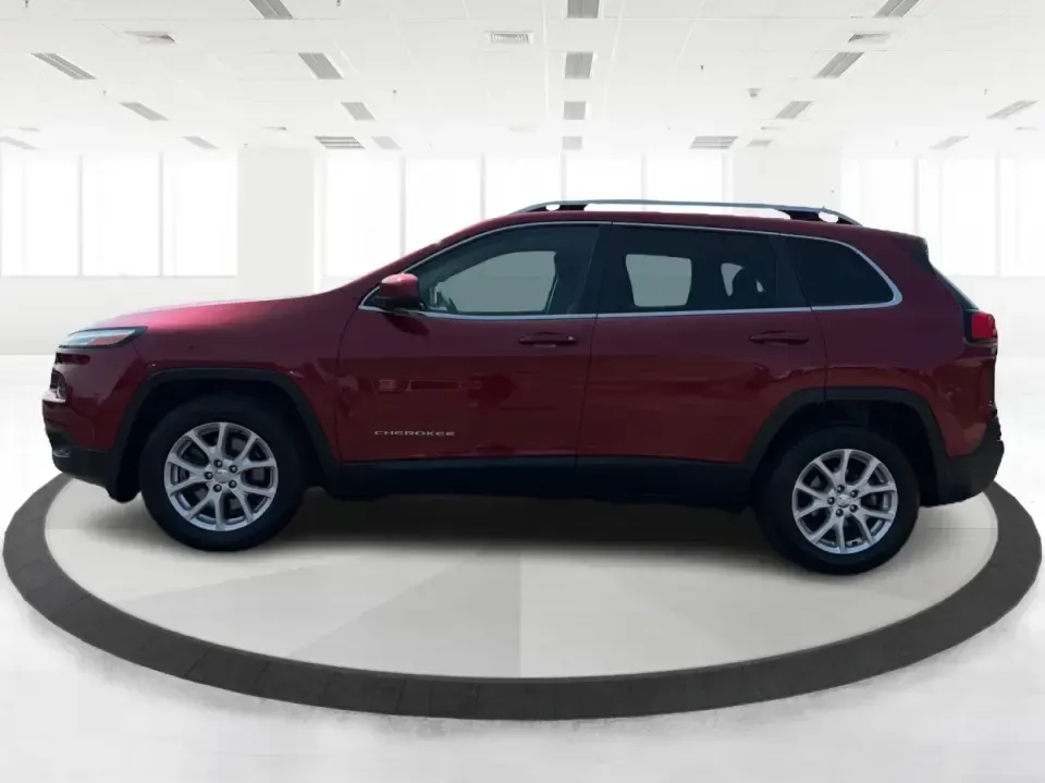 2017 Jeep Cherokee Latitude FWD (1C4PJLCB5HW) with an 2.4L L4 DOHC 16V engine, 9-Speed Automatic transmission, located at 401 Woodman Dr, Riverside, OH, 45431, (937) 908-9800, 39.760899, -84.123421 - Need a crossover that fits real life in the Miami Valley-school drop-offs, I675 commutes, grocery runs, and the occasional weekend escape to Carillon Historical Park or a hike near the Mad River? This 2017 Jeep Cherokee Latitude FWD in Deep Cherry Red Crystal Pearlcoat is built for everyday versatil- Photo#5