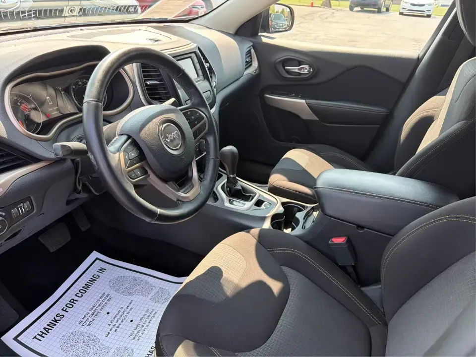 2017 Jeep Cherokee Latitude FWD (1C4PJLCB5HW) with an 2.4L L4 DOHC 16V engine, 9-Speed Automatic transmission, located at 401 Woodman Dr, Riverside, OH, 45431, (937) 908-9800, 39.760899, -84.123421 - Need a crossover that fits real life in the Miami Valley-school drop-offs, I675 commutes, grocery runs, and the occasional weekend escape to Carillon Historical Park or a hike near the Mad River? This 2017 Jeep Cherokee Latitude FWD in Deep Cherry Red Crystal Pearlcoat is built for everyday versatil- Photo#9