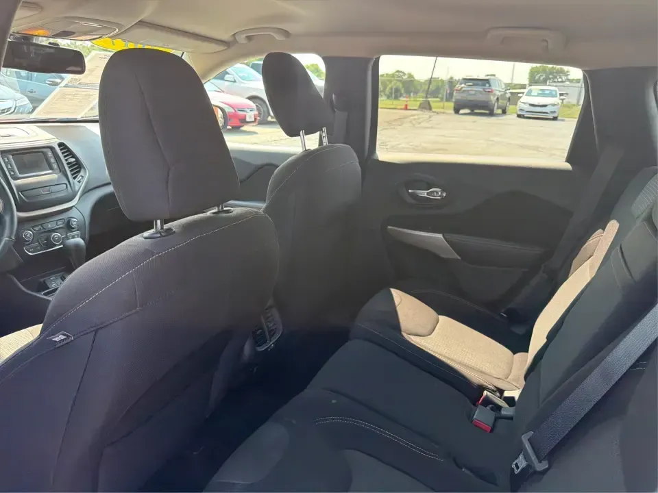 2017 Jeep Cherokee Latitude FWD (1C4PJLCB5HW) with an 2.4L L4 DOHC 16V engine, 9-Speed Automatic transmission, located at 401 Woodman Dr, Riverside, OH, 45431, (937) 908-9800, 39.760899, -84.123421 - Need a crossover that fits real life in the Miami Valley-school drop-offs, I675 commutes, grocery runs, and the occasional weekend escape to Carillon Historical Park or a hike near the Mad River? This 2017 Jeep Cherokee Latitude FWD in Deep Cherry Red Crystal Pearlcoat is built for everyday versatil- Photo#10