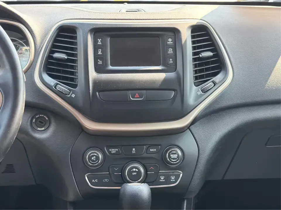 2017 Jeep Cherokee Latitude FWD (1C4PJLCB5HW) with an 2.4L L4 DOHC 16V engine, 9-Speed Automatic transmission, located at 401 Woodman Dr, Riverside, OH, 45431, (937) 908-9800, 39.760899, -84.123421 - Need a crossover that fits real life in the Miami Valley-school drop-offs, I675 commutes, grocery runs, and the occasional weekend escape to Carillon Historical Park or a hike near the Mad River? This 2017 Jeep Cherokee Latitude FWD in Deep Cherry Red Crystal Pearlcoat is built for everyday versatil- Photo#13