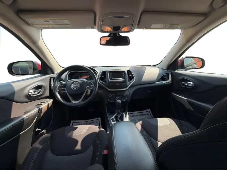 2017 Jeep Cherokee Latitude FWD (1C4PJLCB5HW) with an 2.4L L4 DOHC 16V engine, 9-Speed Automatic transmission, located at 401 Woodman Dr, Riverside, OH, 45431, (937) 908-9800, 39.760899, -84.123421 - Need a crossover that fits real life in the Miami Valley-school drop-offs, I675 commutes, grocery runs, and the occasional weekend escape to Carillon Historical Park or a hike near the Mad River? This 2017 Jeep Cherokee Latitude FWD in Deep Cherry Red Crystal Pearlcoat is built for everyday versatil- Photo#22