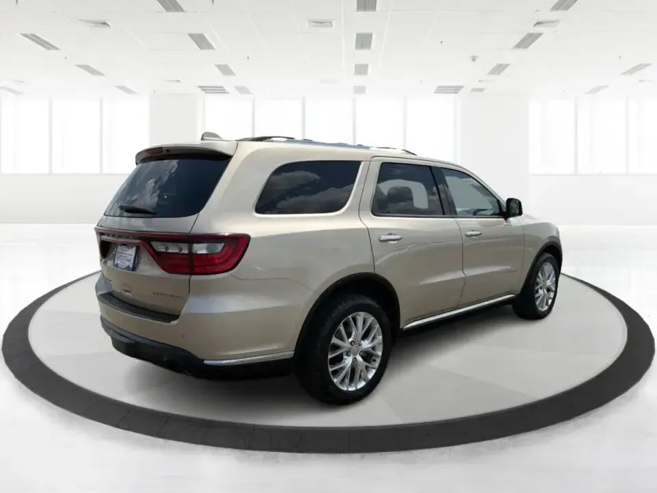 2014 Dodge Durango Citadel AWD (1C4RDJEG2EC) with an 3.6L V6 DOHC 24V engine, 8-Speed Automatic transmission, located at 401 Woodman Dr, Riverside, OH, 45431, (937) 908-9800, 39.760899, -84.123421 - Make every day feel easier-whether you're loading up the kids for school in Riverside, planning a weekend getaway to Caesar Creek, or tackling winter weather on I675. This 2014 Dodge Durango Citadel AWD is the kind of three-row SUV that fits real life: roomy for growing families, confident for long- Photo#2