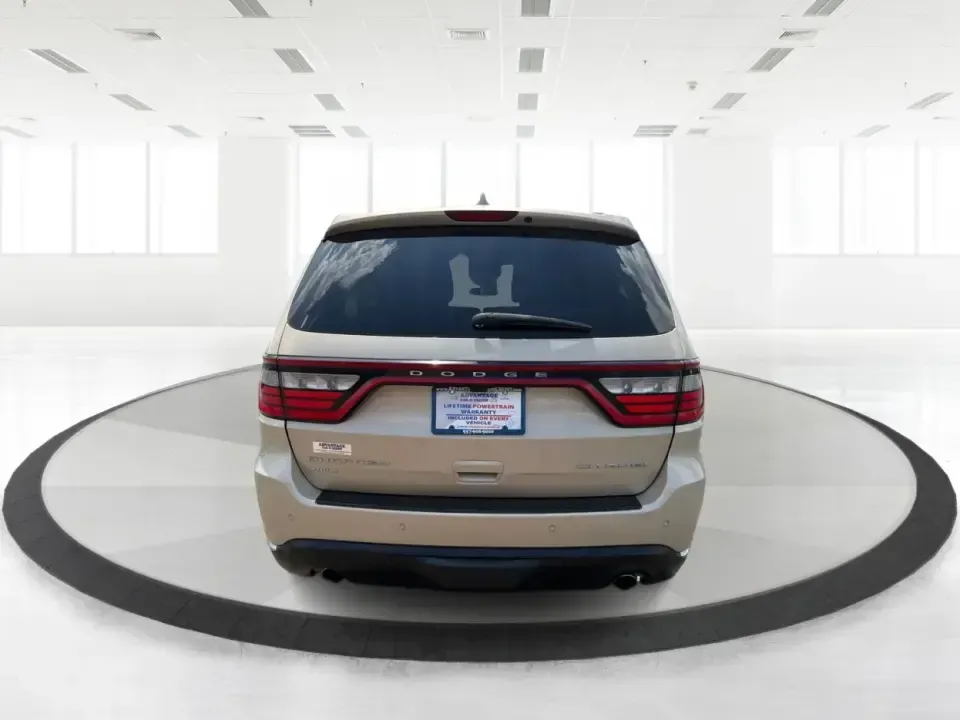 2014 Dodge Durango Citadel AWD (1C4RDJEG2EC) with an 3.6L V6 DOHC 24V engine, 8-Speed Automatic transmission, located at 401 Woodman Dr, Riverside, OH, 45431, (937) 908-9800, 39.760899, -84.123421 - Make every day feel easier-whether you're loading up the kids for school in Riverside, planning a weekend getaway to Caesar Creek, or tackling winter weather on I675. This 2014 Dodge Durango Citadel AWD is the kind of three-row SUV that fits real life: roomy for growing families, confident for long- Photo#3