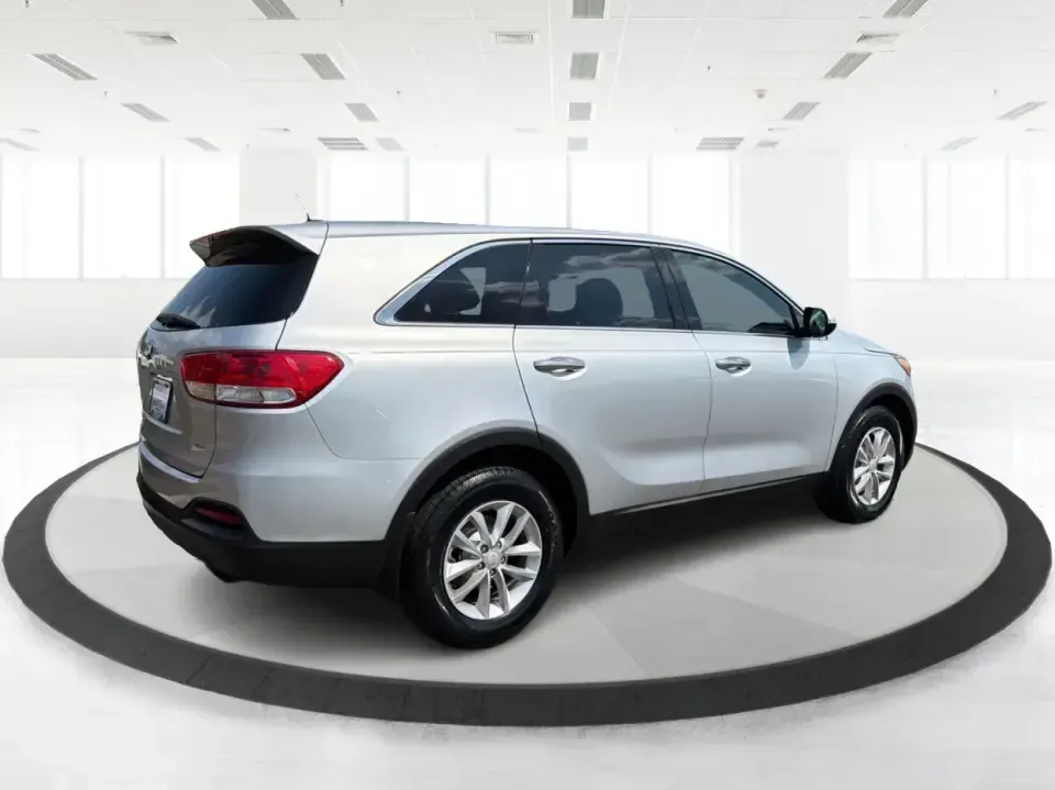 2018 Kia Sorento LX 2WD (5XYPG4A33JG) with an 2.4L L4 DOHC 16V engine, 6-Speed Automatic transmission, located at 1230 East Main St, Xenia, OH, 45385, (937) 908-9800, 39.688026, -83.910172 - Big weekend plans, a busy school schedule, and a daily commute down US-35 all call for one thing: a dependable SUV that fits real life. This 2018 Kia Sorento LX 2WD in Sparkling Silver is a smart pick for Xenia drivers who want comfortable space for passengers and cargo without the bulk of a full-si- Photo#2