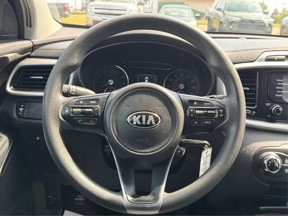 2018 Kia Sorento LX 2WD (5XYPG4A33JG) with an 2.4L L4 DOHC 16V engine, 6-Speed Automatic transmission, located at 1230 East Main St, Xenia, OH, 45385, (937) 908-9800, 39.688026, -83.910172 - Big weekend plans, a busy school schedule, and a daily commute down US-35 all call for one thing: a dependable SUV that fits real life. This 2018 Kia Sorento LX 2WD in Sparkling Silver is a smart pick for Xenia drivers who want comfortable space for passengers and cargo without the bulk of a full-si- Photo#16