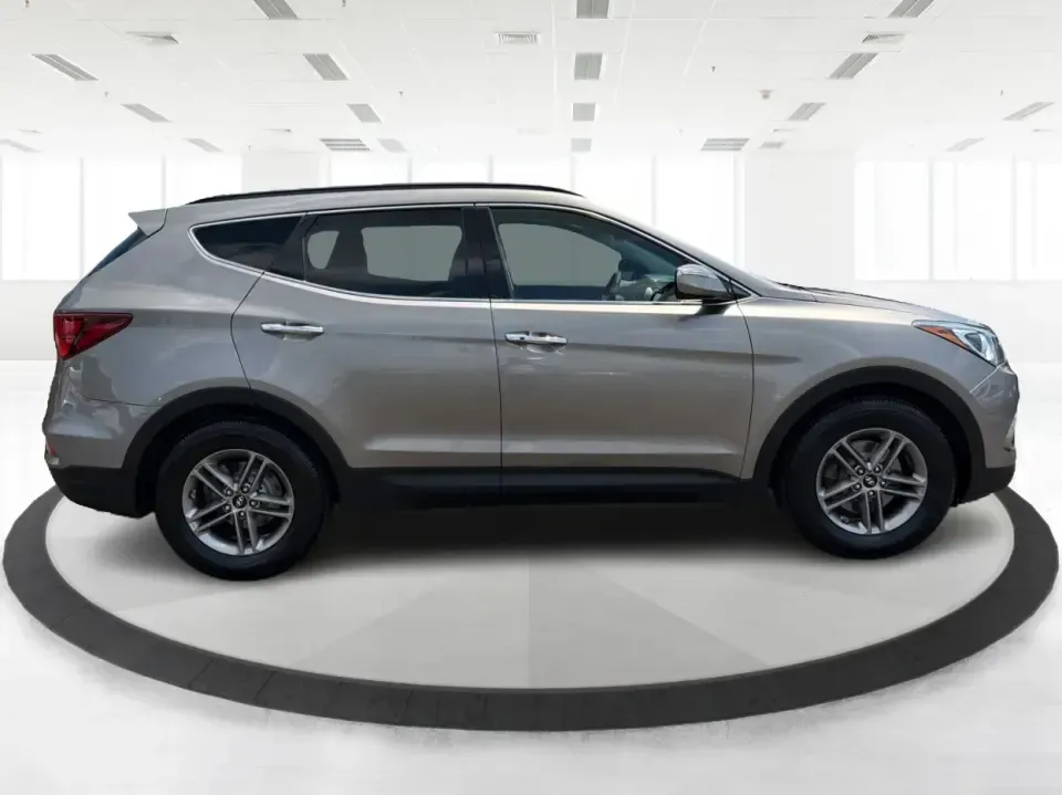 2017 Hyundai Santa Fe Sport 2.4 FWD (5XYZU3LBXHG) with an 2.4L L4 DOHC 16V engine, 6-Speed Automatic transmission, located at 1099 N County Rd 25A , Troy, OH, 45373, (937) 908-9800, 40.057079, -84.212883 - Pack the kids for school drop-off, load up groceries for the week, and still have room for a spontaneous weekend escape-this 2017 Hyundai Santa Fe Sport is built for real life in Troy, Ohio. With SUV practicality, comfortable seating, and the kind of everyday tech that makes commuting smoother, it's- Photo#1
