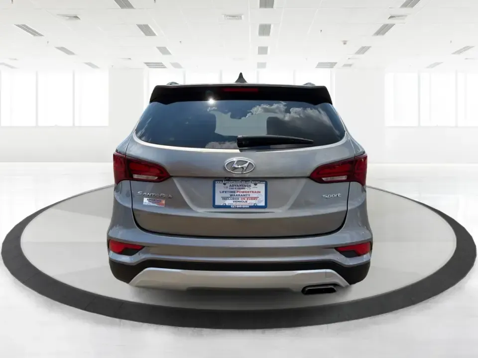 2017 Hyundai Santa Fe Sport 2.4 FWD (5XYZU3LBXHG) with an 2.4L L4 DOHC 16V engine, 6-Speed Automatic transmission, located at 1099 N County Rd 25A , Troy, OH, 45373, (937) 908-9800, 40.057079, -84.212883 - Pack the kids for school drop-off, load up groceries for the week, and still have room for a spontaneous weekend escape-this 2017 Hyundai Santa Fe Sport is built for real life in Troy, Ohio. With SUV practicality, comfortable seating, and the kind of everyday tech that makes commuting smoother, it's- Photo#3