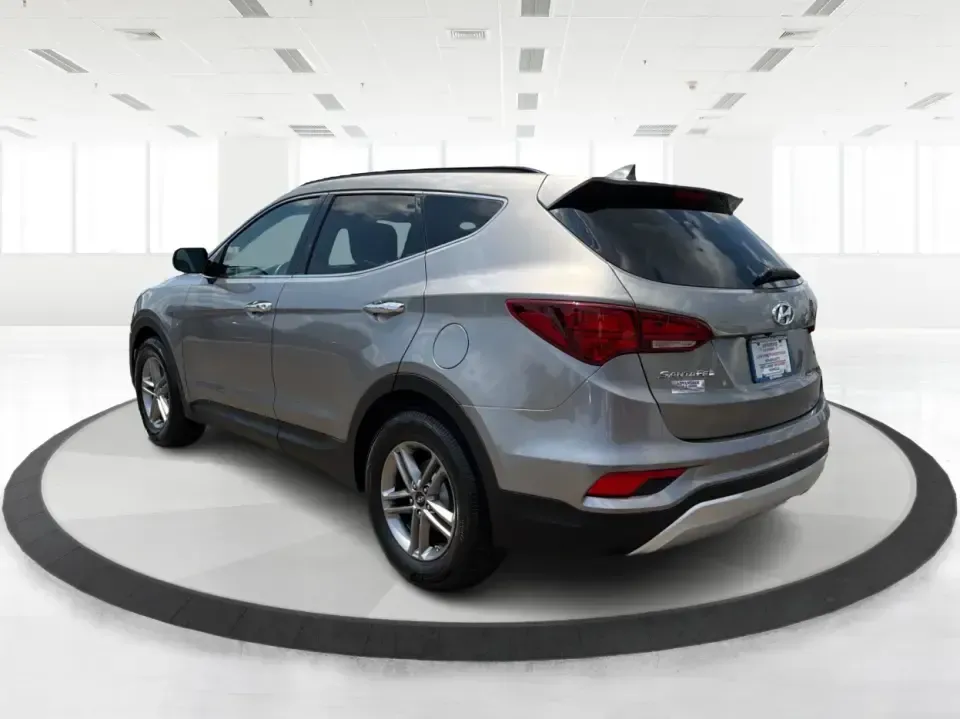 2017 Hyundai Santa Fe Sport 2.4 FWD (5XYZU3LBXHG) with an 2.4L L4 DOHC 16V engine, 6-Speed Automatic transmission, located at 1099 N County Rd 25A , Troy, OH, 45373, (937) 908-9800, 40.057079, -84.212883 - Pack the kids for school drop-off, load up groceries for the week, and still have room for a spontaneous weekend escape-this 2017 Hyundai Santa Fe Sport is built for real life in Troy, Ohio. With SUV practicality, comfortable seating, and the kind of everyday tech that makes commuting smoother, it's- Photo#4