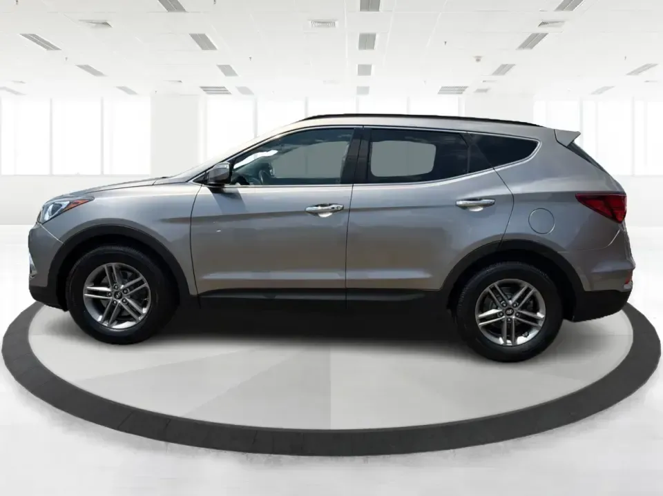 2017 Hyundai Santa Fe Sport 2.4 FWD (5XYZU3LBXHG) with an 2.4L L4 DOHC 16V engine, 6-Speed Automatic transmission, located at 1099 N County Rd 25A , Troy, OH, 45373, (937) 908-9800, 40.057079, -84.212883 - Pack the kids for school drop-off, load up groceries for the week, and still have room for a spontaneous weekend escape-this 2017 Hyundai Santa Fe Sport is built for real life in Troy, Ohio. With SUV practicality, comfortable seating, and the kind of everyday tech that makes commuting smoother, it's- Photo#5